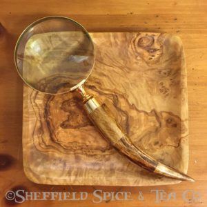 magnifying glass brown wood horn
