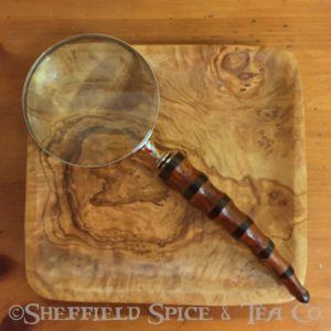 magnifying glass carved wood horn