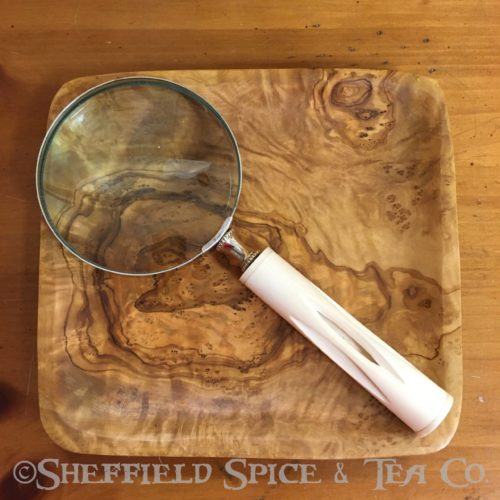 magnifying glass white carved bone